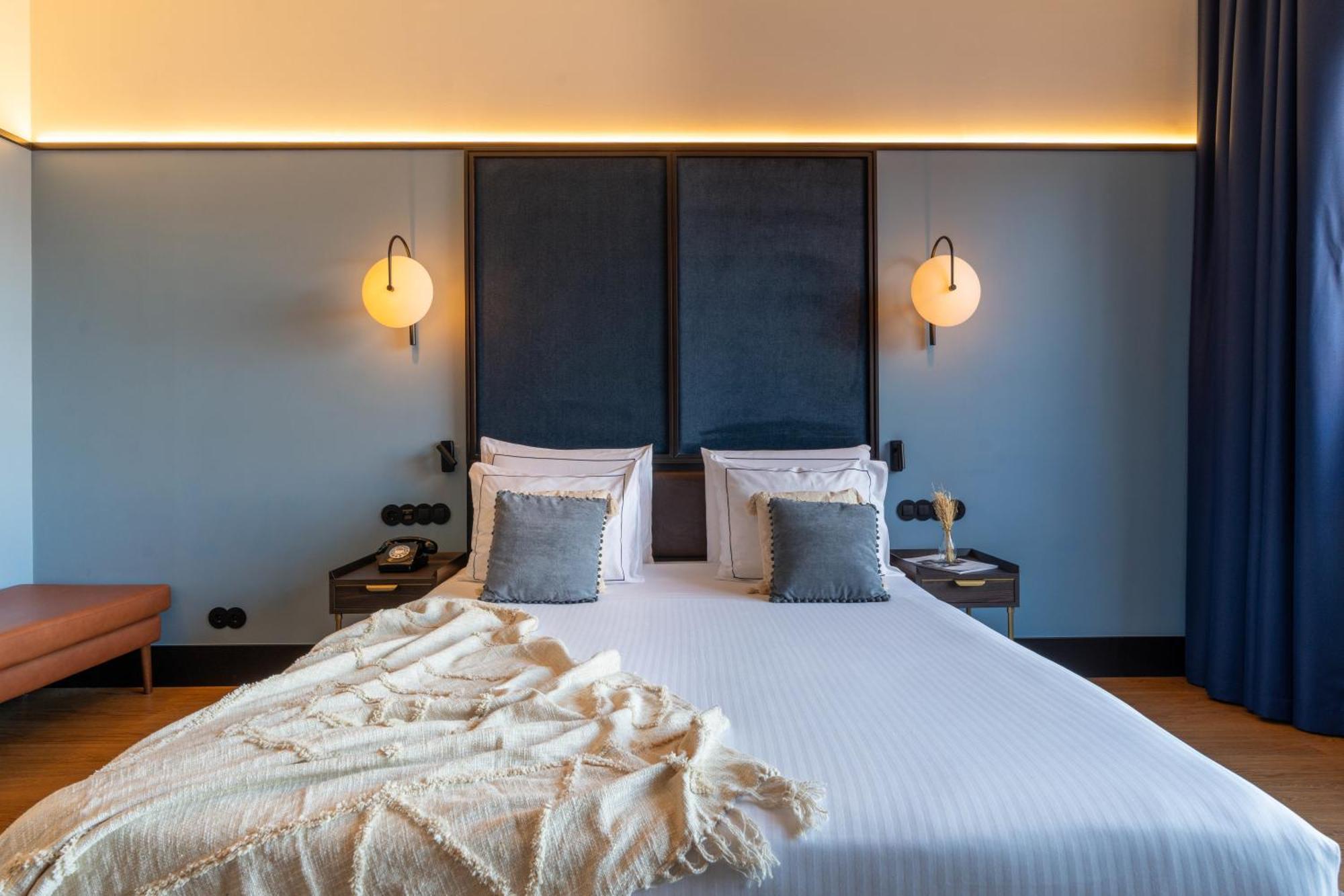 The Editory Riverside Hotel, An Historic Hotel Lisboa Exteriör bild A bedroom at the hotel